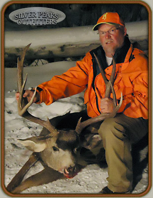 Tim with another trophy Muley Buck that he's taken from this private ranch at SPO's Mule Deer Hunting Camp #4