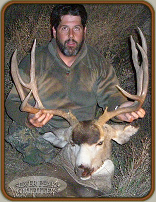 Kevin shows off his trophy Muley Buck, taken with Silver Peaks Outfitters of Southwest Colorado