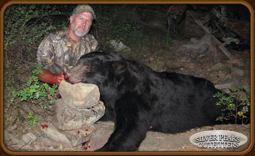 Wally with his Trophy Boone & Crockett class Bear taken with Silver Peaks Outfitters of Southwest Colorado.